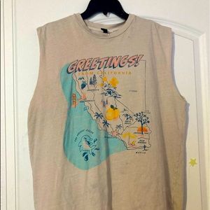 cream sleeveless tee